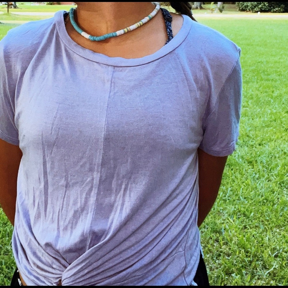 Purple shirt very comfortable! It’s a size sm and I hope like it it’s purple